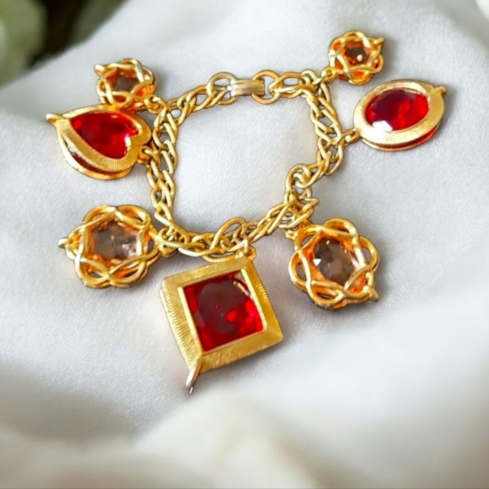 Eve St Laurent Bracelet Elegant Gold Toned RED  & TOPAZ Charm Bracelet.